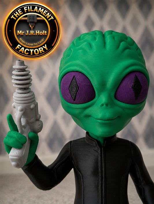 Green Alien Figurine with Ray Gun – Classic Sci-Fi Desk Toy – UK Seller